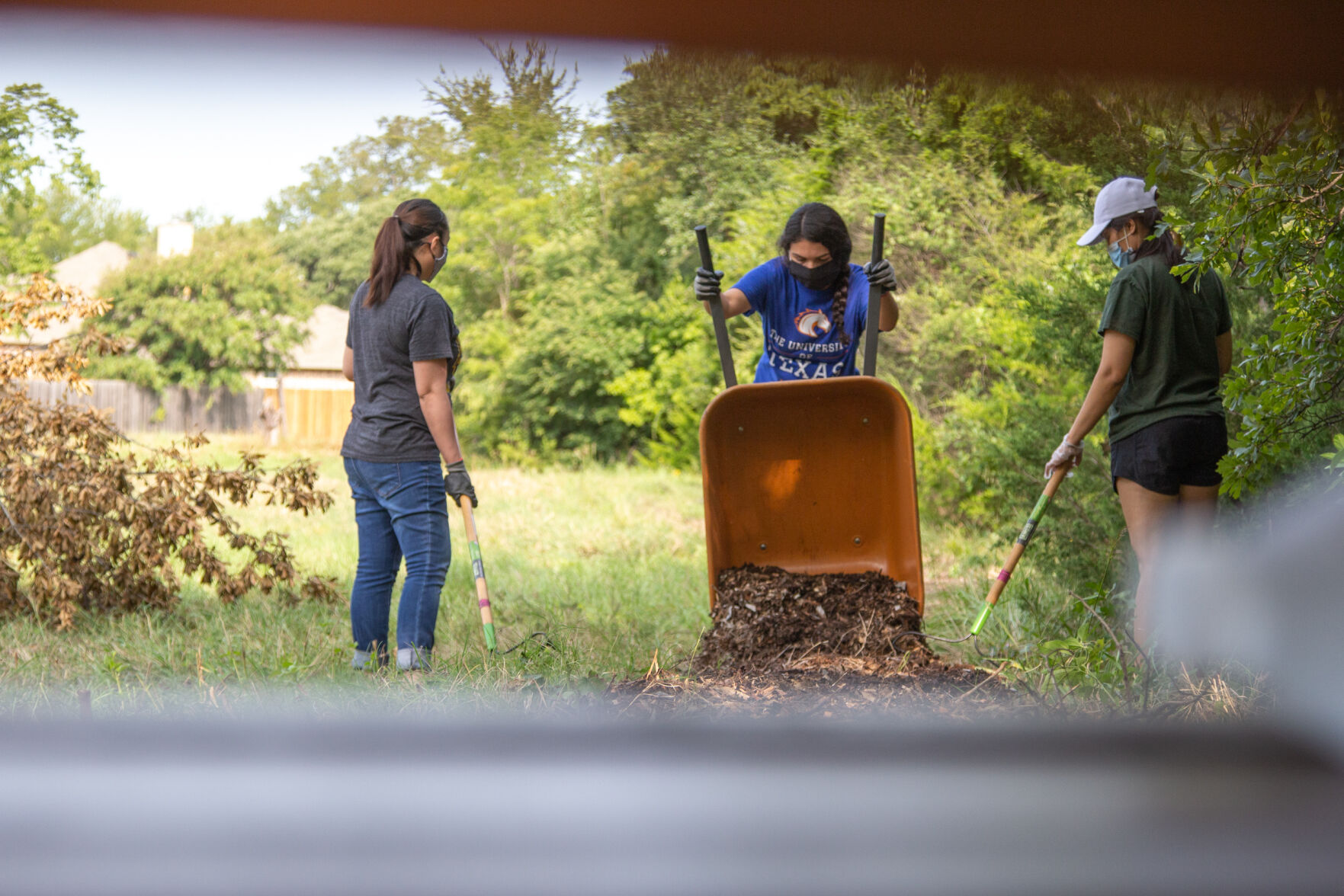 Photos: Volunteers improve trails at O.S. Gray Natural Area for Super Service Saturday
